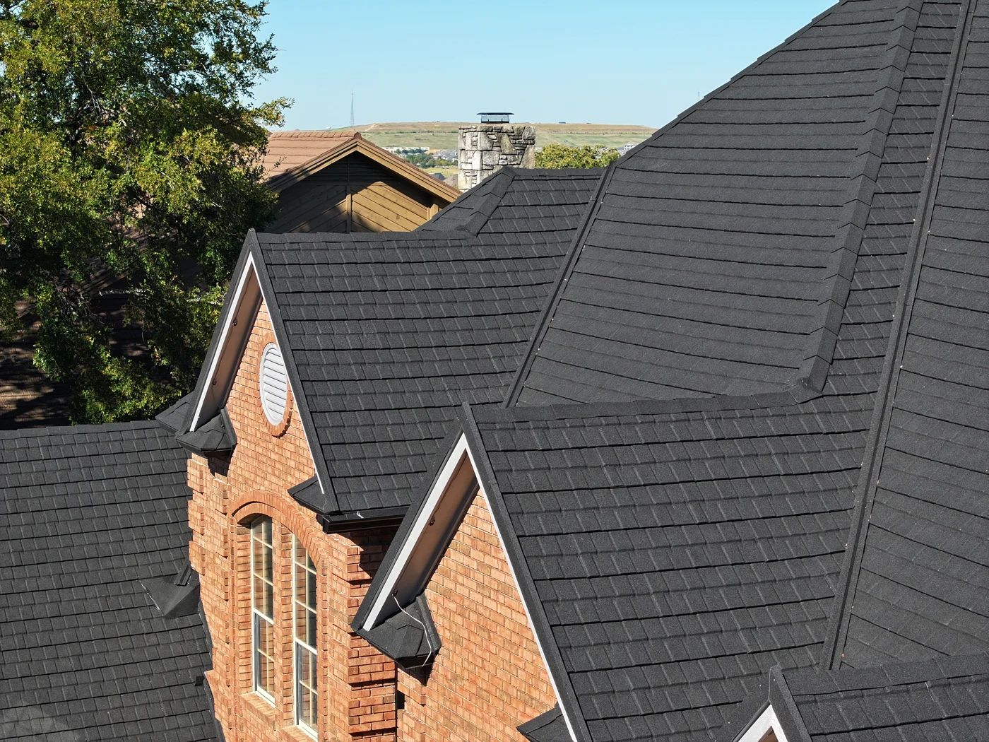 Dimensional black Stormetal shingles on a residential roof